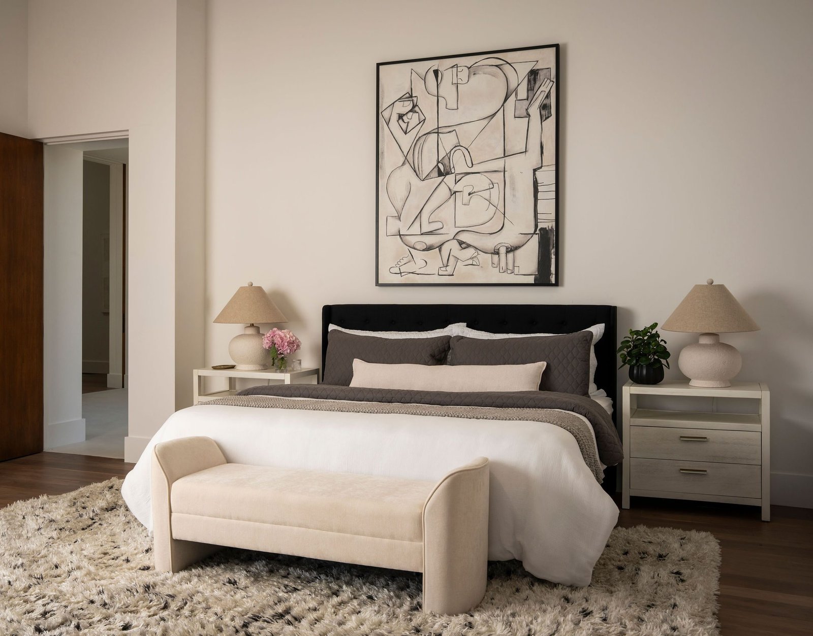 Bedroom with a black bed frame