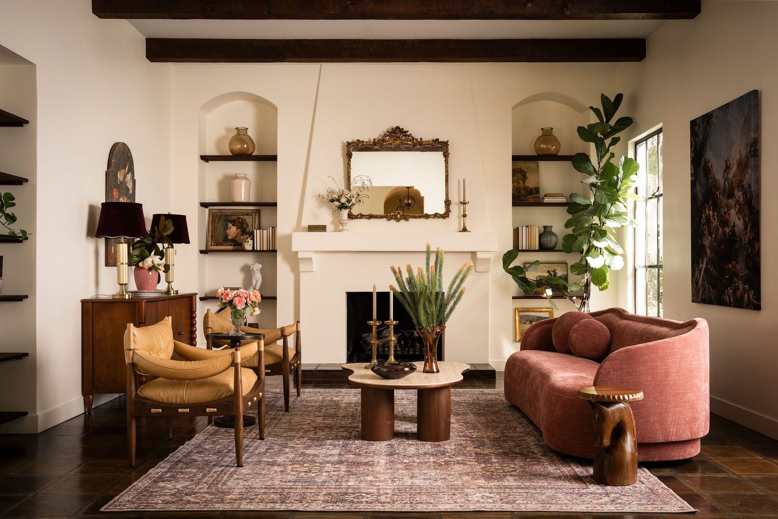 Eclectic living room with a pink sofa
